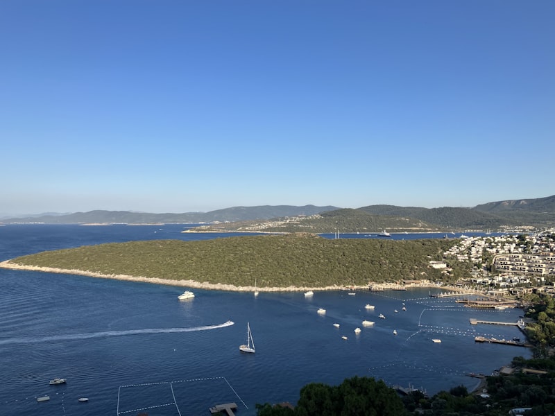a body of water with boats floating on top of it
